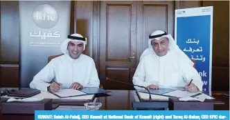  ??  ?? KUWAIT: Salah Al-Fulaij, CEO Kuwait at National Bank of Kuwait (right) and Tareq Al-Bahar, CEO KFIC during the signing ceremony.
