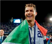 ?? AFP ?? Real Madrid’s Cristiano Ronaldo smiles as he celebrates at the end of the La Liga match against Malaga. —