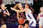  ?? JEFF GILBERT / CONTRIBUTE­D ?? Fort Loramie’s Kenzie Hoelscher works to score against Convoy Crestview’s Cali Gregory during Thursday’s Division IV state semifinal at UD Arena. Loramie won 6624 and Hoelscher scored 12 points.
