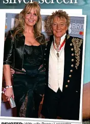  ??  ?? DEVOTED: With wife Penny Lancaster