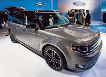  ?? Allen J. Schaben Los Angeles Times ?? THE FORD FLEX is selling well in California even though gas prices are at record levels. It gets about 20 mpg and costs about $75 to fill up. The starting price for the Flex, a convention­al gas vehicle, is about $30,000.