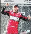  ?? ?? NASCAR Cup Series driver Ross Chastain (1) celebrates the win in Victory Lane following a NASCAR Cup Series auto race, on April 24, in Talladega, Ala. (AP)