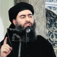  ?? MILITANT VIDEO VIA THE ASSOCIATED PRESS FILES ?? This 2014 image purports to show the slippery leader of the Islamic State group, Abu Bakr al-Baghdadi.