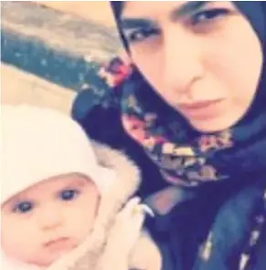  ??  ?? UNITED IN DEATH Mum Farah Hamdan cuddled her youngest daughter until the end