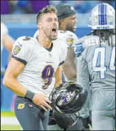  ?? The Associated Press ?? Duane Burleson
Baltimore Ravens kicker Justin Tucker reacts after kicking a 66-yard field goal to beat the Detroit Lions on Sunday.