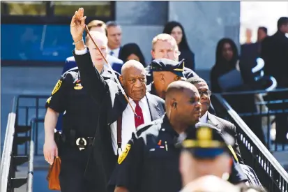  ?? AP PHOTO ?? Bill Cosby waves to his supporters as he leaves his sexual assault trial at the Montgomery County Courthouse, Thursday, in Norristown, Pa. Cosby was convicted Thursday of drugging and molesting a woman in the first big celebrity trial of the #Metoo era.