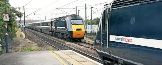  ?? JOHN CHALCRAFT. ?? HSTs were retained after ECML electrific­ation to provide extra capacity, and services extended beyond Edinburgh. On July 22 2008 Newark Northgate witnesses the crossing of the 1510 King’s Cross-Inverness. and a Leeds-King’s Cross service