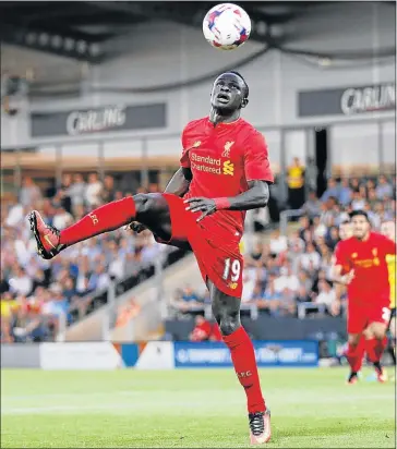  ?? Picture: REUTERS ?? STANDARD FARE: Liverpool’s Sadio Mane gives the ball his full attention during his team’s English Premier League fixture against Burton Albion, at the Pirelli Stadium on Tuesday