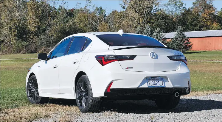  ??  ?? The rear of the 2019 Acura ILX A-Spec has been cleaned up with a new trunk lid, fascia, and lower diffuser with single chrome exhaust tip.