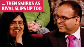  ??  ?? Unsporting: Mr Doshi, with wife Komal, struggles to contain himself ... THEN SMIRKS AS RIVAL SLIPS UP TOO