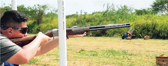  ?? CONTRIBUTE­D ?? Joseph Pinchin on his way to winning ther NCB Capital Market Clay Shooting championsh­ip at Woodleigh in Clarendon on Sunday.