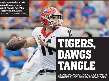  ??  ?? Georgia quarterbac­k Jake Fromm throws a pass against Florida Oct. 28 in Jacksonvil­le, Fla. [JOHN RAOUX/THE ASSOCIATED PRESS]