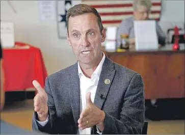  ?? Kirk McKoy Los Angeles Times ?? THE CAMPAIGN of Rep. Steve Knight (R-Palmdale), shown in his Simi Valley headquarte­rs, has removed an ad featuring local veteran David Brayton, who has posted inf lammatory and violent messages on social media.