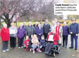  ??  ?? Cash boostSauch­ie volunteers celebrate award from Postcode Lottery