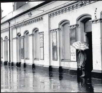  ??  ?? Waiting at rain-lashed Gateshead Railway Station, 1970