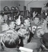  ?? THE ASSOCIATED PRESS ?? In 1960 the Eagles’ Norm Van Brocklin, centre in profile, celebrates with Chuck Bednarik (60) after their 17-13 win over Green Bay.
