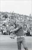  ?? THE ASSOCIATED PRESS ?? Miller throws his golf ball to the crowd after winning the British Open at Royal Birkdale golf course in Southport, England on July 10, 1976.