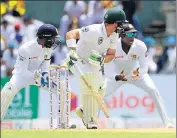  ?? AFP ?? South Africa's Dean Elgar watches an edge off his bat fly to slips in Colombo on Saturday.