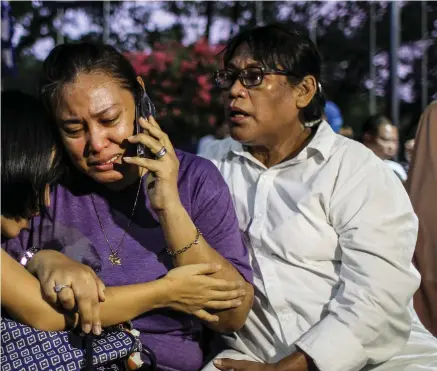  ?? PHOTO: ANTARA FOTO/DHEMAS REVIYANTO/ REUTERS ?? Distraught: Relatives of passengers on Lion Air flight JT610 wait at the airport in Jakarta.