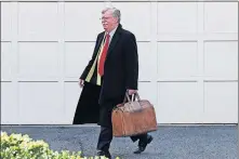  ??  ?? Former national security adviser John Bolton leaves his home in Bethesda, Md., on Tuesday. [LUIS M. ALVAREZ/ THE ASSOCIATED PRESS]