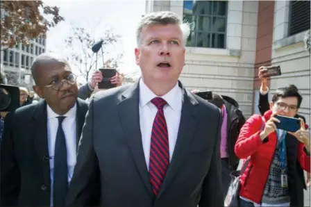  ?? CLIFF OWEN — THE ASSOCIATED PRESS ?? Keven Downing, Paul Manafort’s attorney leaves federal court after Manafort’s sentencing hearing in Washington, Wednesday.