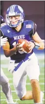  ?? Bob Luckey Jr. / Hearst Connecticu­t Media ?? Darien quarterbac­k Cooper Hancock will lead the Blue Wave against St. Joseph on Saturday in a FCIAC showdown in Trumbull.