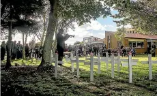  ?? WARWICK SMITH/STUFF ?? Sanson commemorat­es the fallen at the town’s Anzac service yesterday.