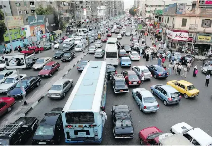  ?? GETTY IMAGES FILES ?? A traffic jam in Cairo, Egypt, can look like a mess, but drivers here remain calm and will sort it out eventually.