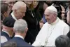  ?? ANDREW MEDICHINI - THE AP ?? In this 2016e photo Pope Francis shakes hands with Vice President Joe Biden as he takes part in a congress on the progress of regenerati­ve medicine and its cultural impact, being held in the Pope Paul VI hall at the Vatican. Biden is scheduled to meet with Pope Francis this coming Friday at the Vatican.