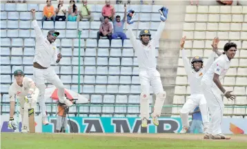  ??  ?? Debutant Lakshan Sandakan (R) impressed at Pallekele as Sri Lanka went on to record the first ever series whitewash against Australia in 2015 - FIle pic