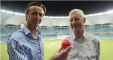  ?? — AFP ?? DUBAI: Top officials from the world cricket committee Mike Brearley (R) and John Stephenson look at the pink ball at the Dubai Internatio­nal Cricket Stadium in the Gulf Emirate on Saturday. Top officials of the World Cricket Committee insisted that...