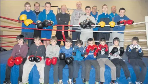  ??  ?? Senior members of Wicklow Boxing Club with their mentors.