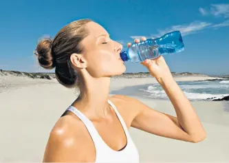  ??  ?? Bottled up: combat holiday constipati­on by drinking bottled water