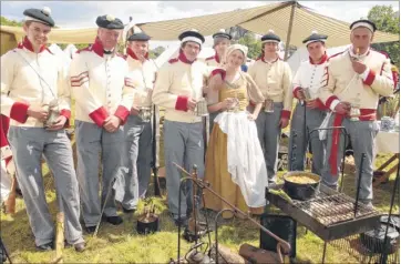  ?? Picture: Ruth Cuerden FM2613535 ?? Nichola Butland and the 32nd Cornwall regiment relax before their Waterloo