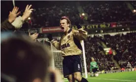  ?? Photograph: Michael Steele/Getty Images ?? Freddie Ljungberg celebrates scoring the second Arsenal goal in a titanic clash at Anfield in December 2001.