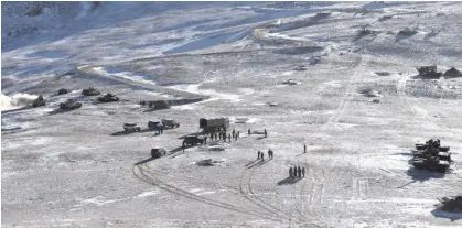  ?? ?? The Indian and Chinese armies during an earlier disengagem­ent in February 2021. Photograph: Indian Army/Reuters