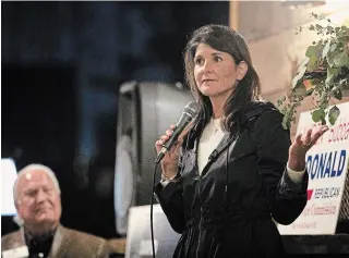  ?? JESSICA MCGOWAN GETTY IMAGES ?? Former UN ambassador Nikki Haley, seen at a GOP campaign rally in Georgia in December, said she was ”disgusted” by Trump’s conduct on Jan. 6, the day of the Capitol riot.