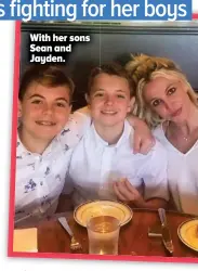  ??  ?? With her sons Sean and Jayden.