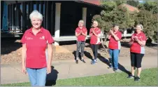  ??  ?? From left: Heart Foundation Golden Shoe Award recipient Leoni Warren is congratula­ted by fellow walkers Norma Robertson, Marilynn Andrews, Lee Swindells and Julie Taylor at the Banora Point Community Centre where the group is based.