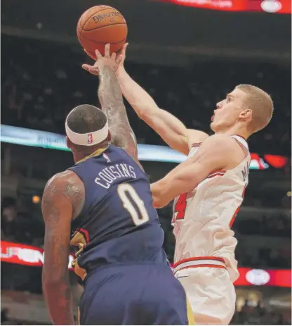  ?? | GETTY IMAGES ?? Lauri Markkanen admitted “I’ve got to work on some things” after attempting to guard Pelicans center DeMarcus Cousins.