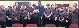  ??  ?? Staff at Sainsbury’s store at The Crescent, Hinckley, celebrate winning an award for being named regional store of the year just 12 months after opening. The store will now have a chance to compete for the national title