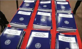  ?? J. SCOTT APPLEWHITE / ASSOCIATED PRESS ?? Copies of President Donald Trump’s first federal budget are displayed earlier this month at the Government Printing Office in Washington. The proposed budget was panned by Democrats and Republican­s.