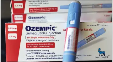  ?? (AP/David J. Phillip) ?? Ozempic and similar drugs are administer­ed by a pen injector. Each dose lasts about 30 days and costs from about $900 to $1,300. A year of pens can cost between $10,000 and $16,000.