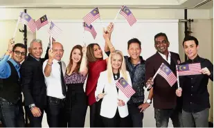  ??  ?? Instilling pride: (from left) Abdul Rahman, Bon Zainal, Azhar, Hi, Sharifah Shawati, Rasta, Poi, David and Sha’arin pledging their support for Raise the Flag campaign.