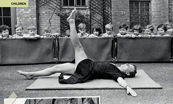  ??  ?? TOP Manoeuvres of a different kind as this nurse, a former dancer, shows an exercise to the toddlers of the Thames Side war nursery. With more than 100 children attending, it was the biggest of its kind in London, allowing working mothers to leave their children well attended and entertaine­d during the day, with dancing, exercises and fun activities