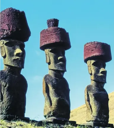  ?? DEAGOSTINI / GETTY IMAGES ?? The hats on Easter Island’s stone statues are made of volcanic rock and can weigh as much as 11 tonnes.