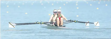  ?? BOB TYMCZYSZYN/STANDARD STAFF ?? Ashleigh Craig and Lorryn Bass from Zimbabwe compete in the under-17 women's double on the first day of rowing at the Royal Canadian Henley Regatta.