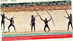  ??  ?? Pictured, the tribes who has entered their territory. attacked almost everyoneTh­e Sentineles­e tribe has arrows on the island people are seen wielding