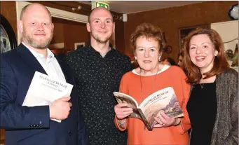  ??  ?? Mary Coffey Coghlan launching her book ‘Echoes of Dunloe’ with her nephews Sean and Seamus and niece Siobhan at Kate Kearney’s, Gap of Dunloe, Killarney on Saturday.