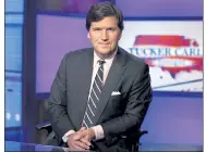  ?? AP FILE PHOTO ?? Fox News’ Tucker Carlson is again fighting with The New York Times.